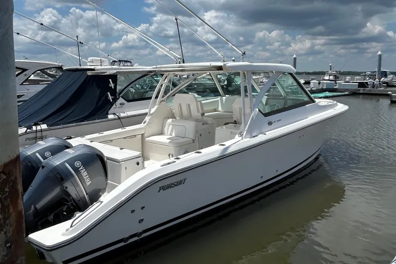  Yacht Photos Pics 2015 Pursuit DC 325 Dual Console boat docked with Yamaha engines.