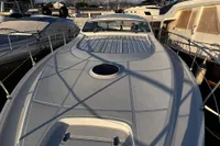 2007 Pershing 50 yacht docked at marina, showcasing sleek deck design.