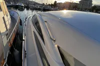 2007 Pershing 50 yacht docked at marina during sunset, with sleek design and modern features.