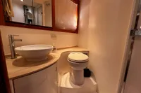 Luxurious bathroom in 2007 Pershing 50 yacht with modern fixtures and elegant design.