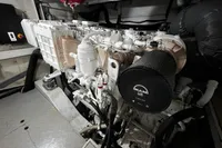 Engine room of a 2007 Pershing 50 yacht, featuring a MAN diesel engine.