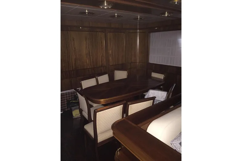  Yacht Photos Pics Luxurious wooden dining area on 1998 Sanlorenzo 82 yacht.