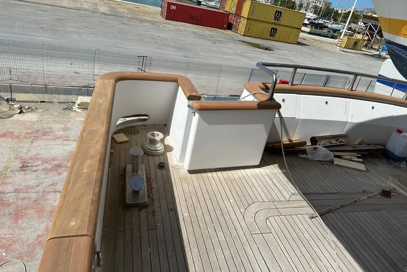  Yacht Photos Pics Deck of 1998 Sanlorenzo 82 yacht with wooden railings and fittings.