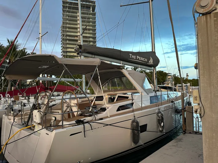 The Perch Yacht Photos Pics 2023 Grand Soleil 46 LC yacht docked at marina, with modern design and sleek lines.