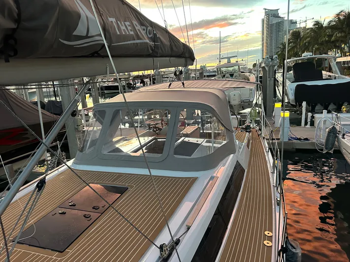 The Perch Yacht Photos Pics 2023 Grand Soleil 46 LC yacht docked at sunset, showcasing sleek design and modern features.