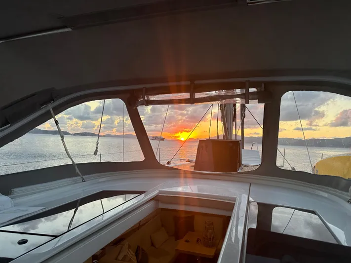 The Perch Yacht Photos Pics Grand Soleil 46 LC yacht interior with sunset view over the ocean, 2023 model.