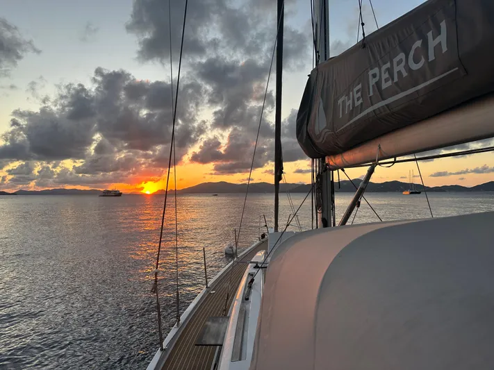 The Perch Yacht Photos Pics Grand Soleil 46 LC yacht at sunset, 2023 model, sailing on calm waters.