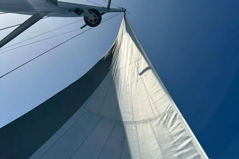 The Perch Yacht Photos Pics Sail of 2023 Grand Soleil 46 LC yacht against clear blue sky.