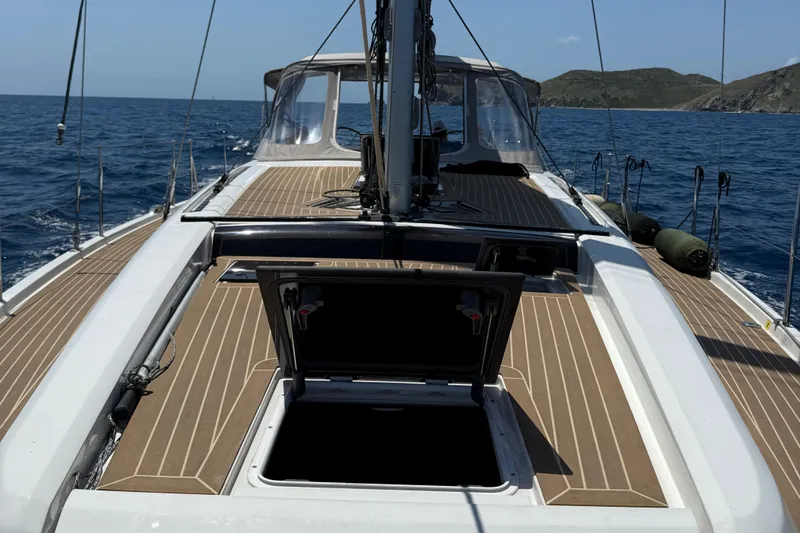 The Perch Yacht Photos Pics 2023 Grand Soleil 46 LC yacht deck on open sea, featuring sleek design and open hatch.