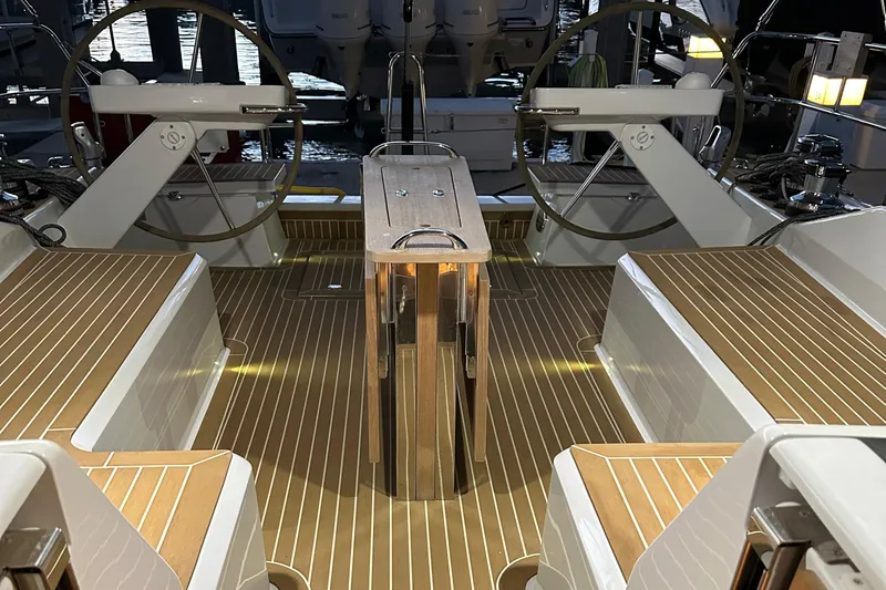 The Perch Yacht Photos Pics 2023 Grand Soleil 46 LC yacht cockpit with dual steering wheels and teak flooring.