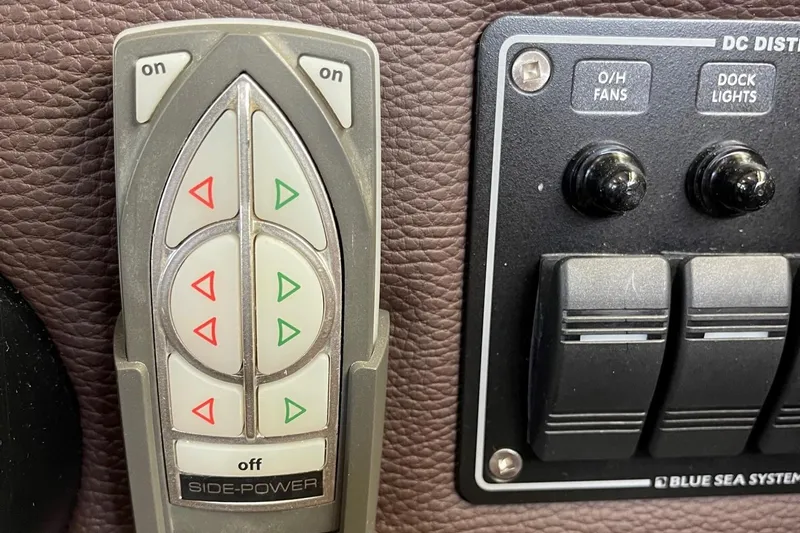  Yacht Photos Pics Control panel of a 2015 Cutwater C-28 boat with Side-Power and Blue Sea Systems switches.