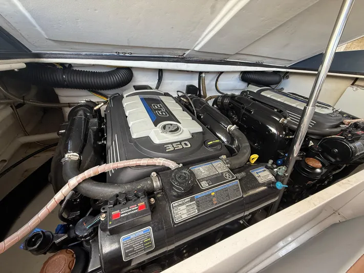 Yacht Photos Pics Engine compartment of a 2021 Frauscher 1017 GT Air boat, featuring dual 350 horsepower engines.