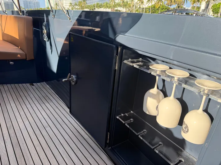  Yacht Photos Pics 2021 Frauscher 1017 GT Air yacht interior with glass holders and seating.