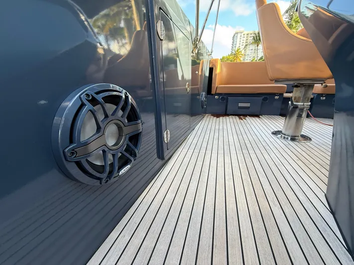  Yacht Photos Pics 2021 Frauscher 1017 GT Air boat deck with speaker and seating.