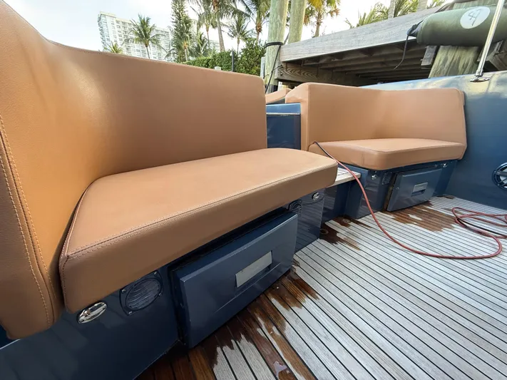  Yacht Photos Pics Luxury seating on 2021 Frauscher 1017 GT Air boat with teak flooring.