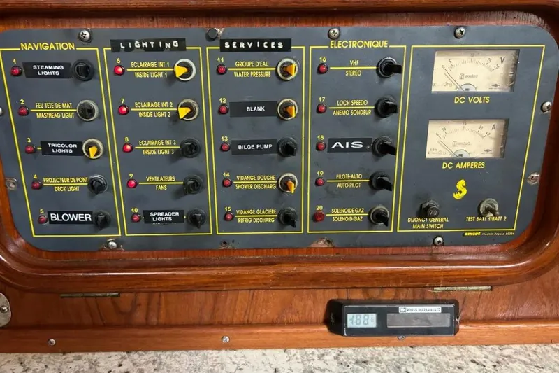 Zephyrus Yacht Photos Pics Control panel of a 1991 Beneteau Oceanis 50 sailboat with navigation and electronic systems.