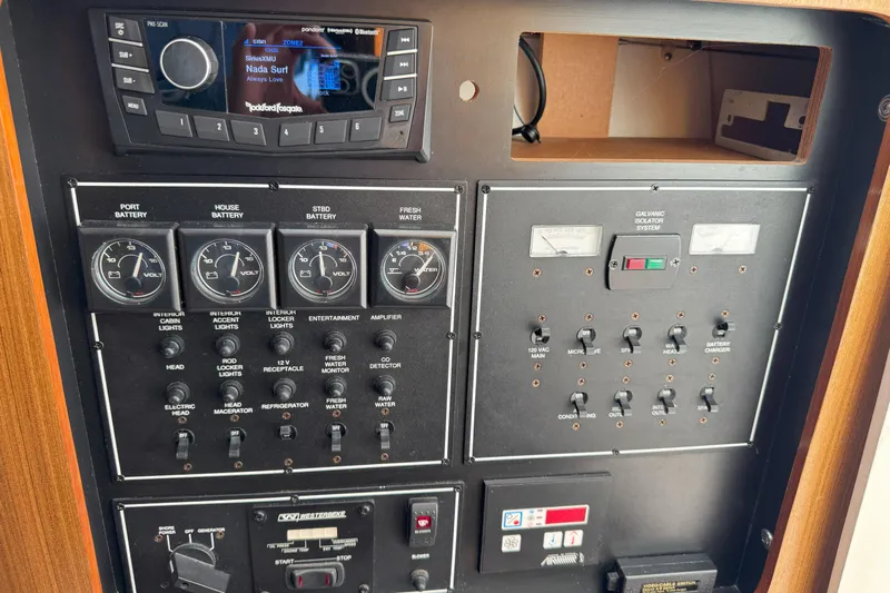  Yacht Photos Pics Control panel of 2006 Pursuit LS 345 Drummond Runner with gauges and switches.