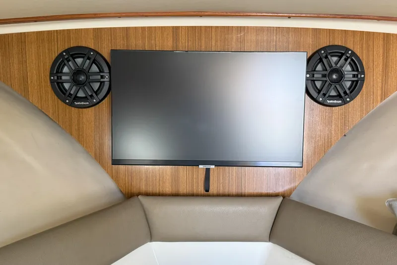  Yacht Photos Pics Interior of 2006 Pursuit LS 345 Drummond Runner with TV and speakers.