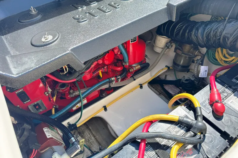  Yacht Photos Pics Engine compartment of 2006 Pursuit LS 345 Drummond Runner with visible wiring and components.