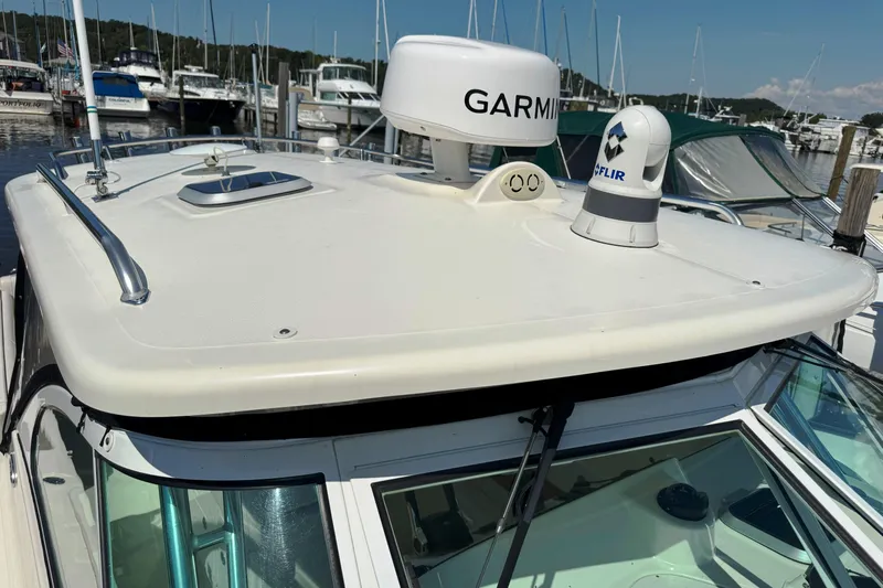  Yacht Photos Pics 2006 Pursuit LS 345 Drummond Runner boat with Garmin and FLIR equipment at marina.