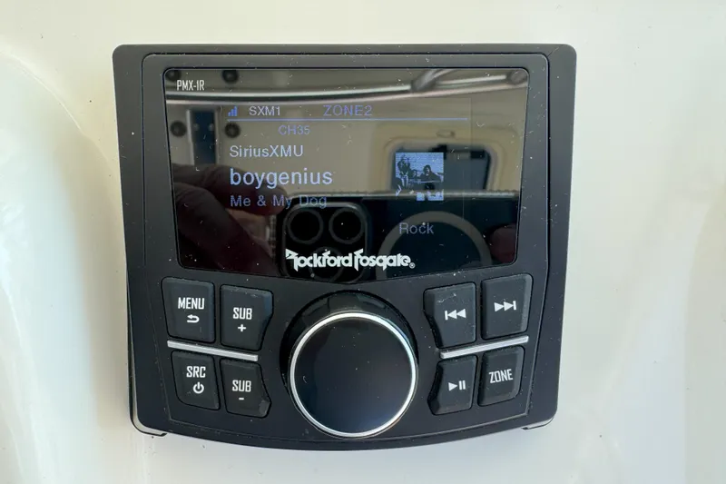  Yacht Photos Pics Rockford Fosgate stereo system in 2006 Pursuit LS 345 Drummond Runner, displaying SiriusXM channel.