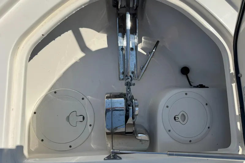  Yacht Photos Pics Anchor compartment of 2006 Pursuit LS 345 Drummond Runner boat with storage hatches.