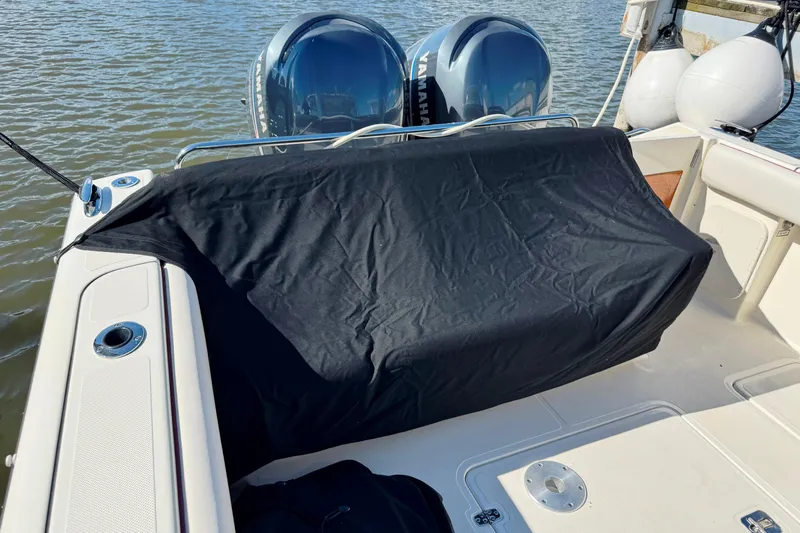  Yacht Photos Pics 2006 Pursuit LS 345 Drummond Runner boat with covered seating and twin Yamaha engines.