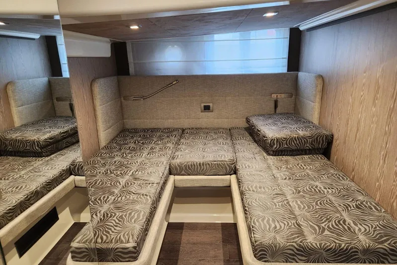  Yacht Photos Pics Interior cabin of 2023 Cranchi M44 HT yacht with stylish seating and modern design.