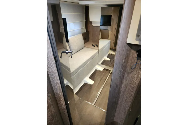  Yacht Photos Pics Interior of 2023 Cranchi M44 HT yacht, featuring modern seating and sleek design.