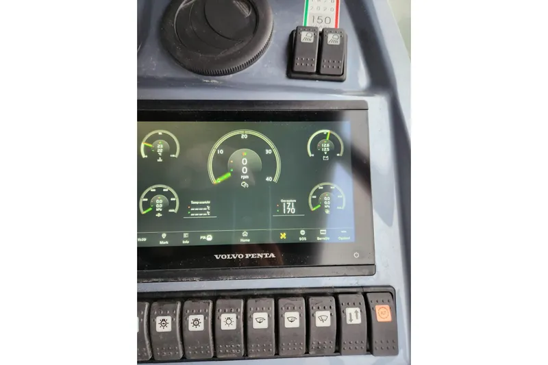  Yacht Photos Pics Dashboard of 2023 Cranchi M44 HT yacht with Volvo Penta display and control switches.