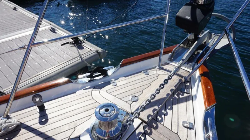 Dolce Vita Yacht Photos Pics Deck of 2008 Oyster 46 yacht with anchor chain and winch.