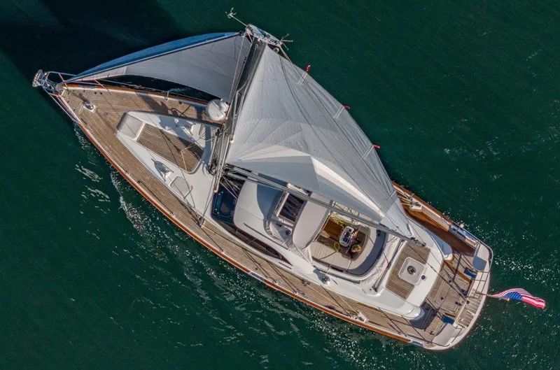 Dolce Vita Yacht Photos Pics Aerial view of 2008 Oyster 46 sailboat on the water.