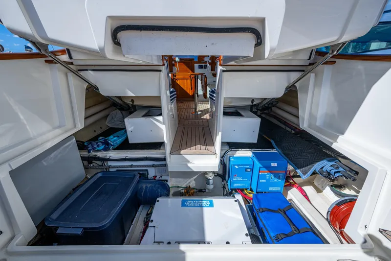 King's Landing Yacht Photos Pics 2024 Hinckley 35 yacht storage area with equipment and supplies.