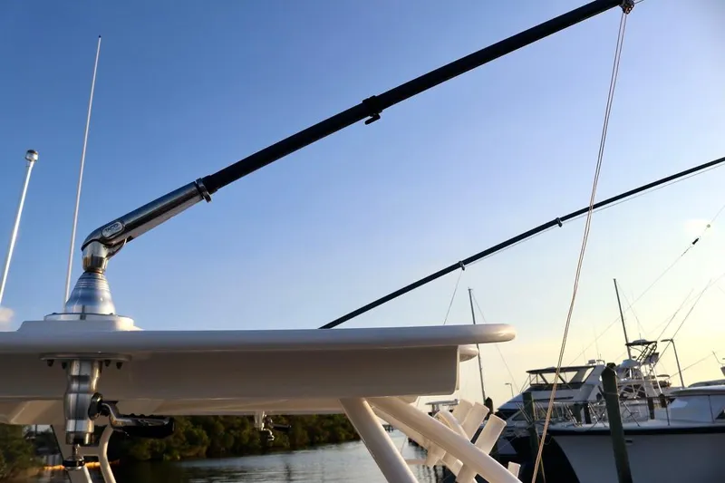 No Name Yacht Photos Pics Fishing rods on a 2021 Regulator 41 boat at a marina.