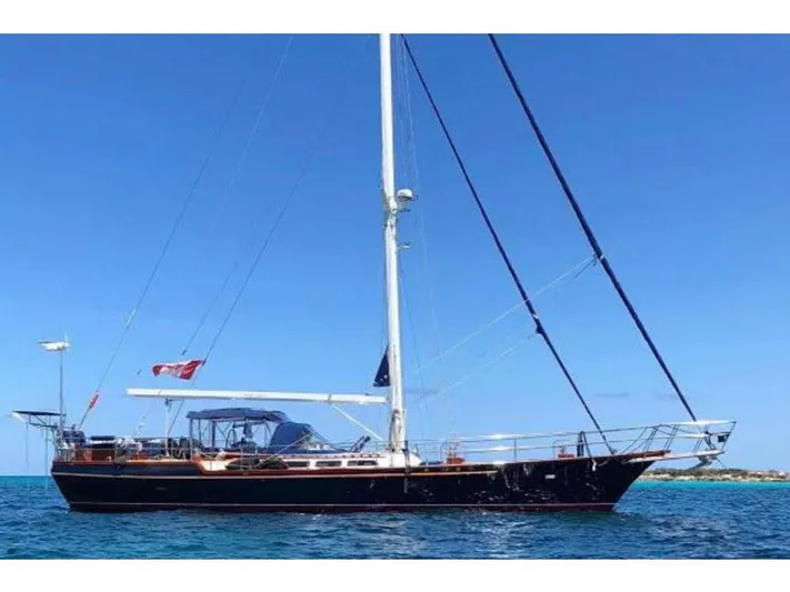 Wind Seeker 1 Yacht Photos Pics Sailing yacht Windship 60, 1989 model, on clear blue ocean under sunny skies.