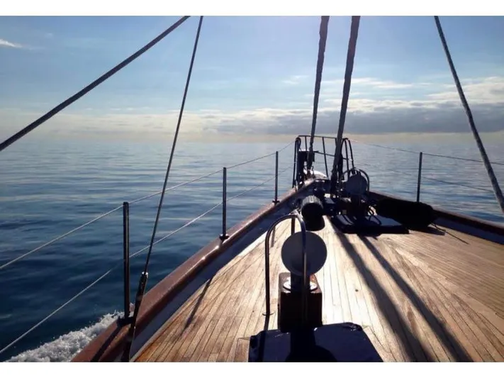 Wind Seeker 1 Yacht Photos Pics Sailing on a 1989 Windship 60 yacht, calm sea and clear sky.