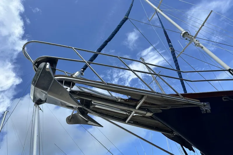 Wind Seeker 1 Yacht Photos Pics Sailboat Windship 60 (1989) with anchor and rigging against a blue sky.