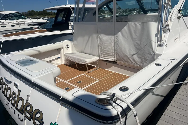  Yacht Photos Pics 2008 Tiara Yachts 3200 Open with teak deck, docked at marina.