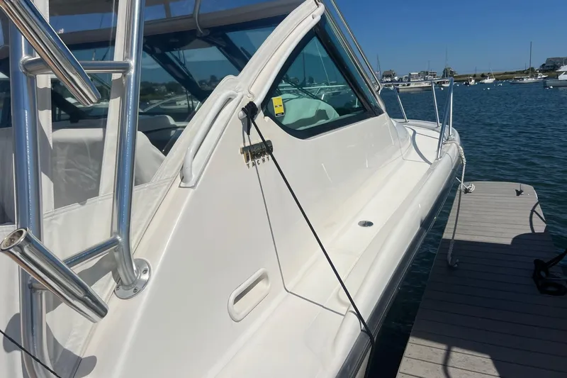  Yacht Photos Pics 2008 Tiara Yachts 3200 Open docked, showcasing sleek design and sturdy construction.