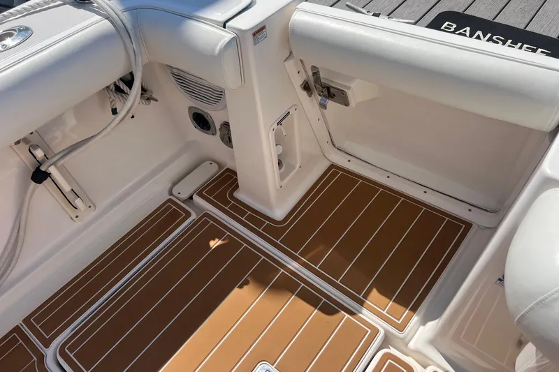  Yacht Photos Pics 2008 Tiara Yachts 3200 Open interior with teak-style flooring and white seating.