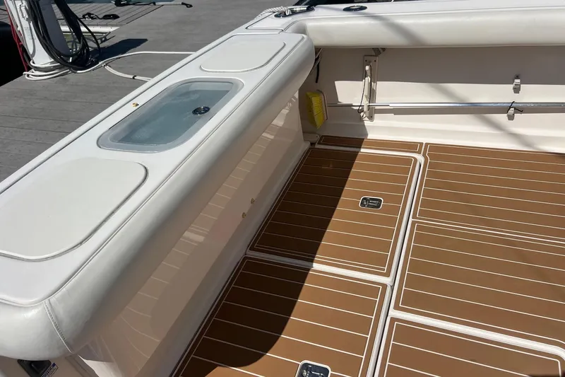  Yacht Photos Pics 2008 Tiara Yachts 3200 Open deck with teak flooring and storage compartments.