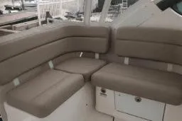  Yacht Photos Pics 2008 Tiara Yachts 3200 Open interior seating with beige cushions.
