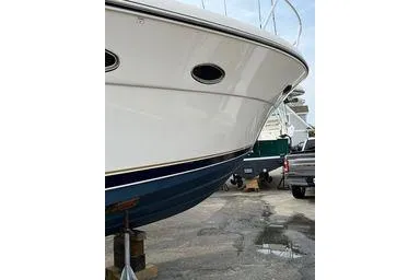  Yacht Photos Pics 2008 Tiara Yachts 3200 Open boat on dry dock, side view.