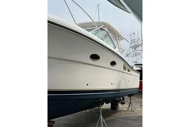  Yacht Photos Pics 2008 Tiara Yachts 3200 Open boat on stands, side view.