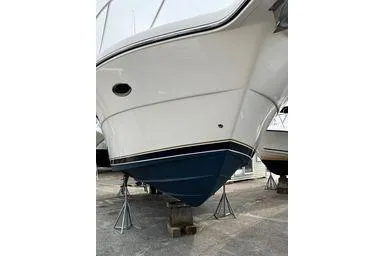  Yacht Photos Pics 2008 Tiara Yachts 3200 Open on stands, showcasing sleek hull design.