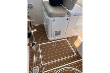  Yacht Photos Pics 2008 Tiara Yachts 3200 Open interior with teak flooring and cushioned seating.