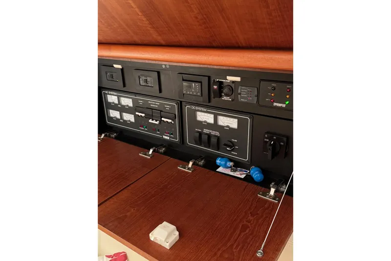 Yacht Photos Pics Electrical control panel of a 2008 Tiara Yachts 3200 Open, featuring various switches and meters.