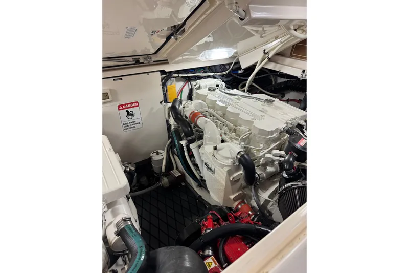  Yacht Photos Pics Engine compartment of a 2008 Tiara Yachts 3200 Open, showcasing detailed machinery and components.