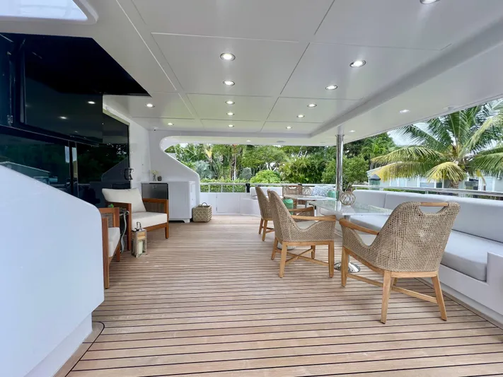 Panacea Yacht Photos Pics Spacious deck of 2011 Mengi Yay 115 MY yacht with elegant seating and modern design.