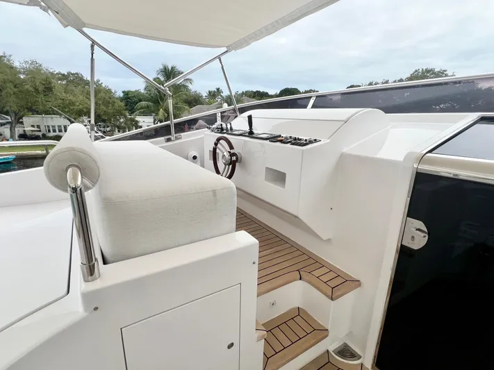 Panacea Yacht Photos Pics Luxury yacht helm with wooden deck, Mengi Yay 115 MY, 2011 model.